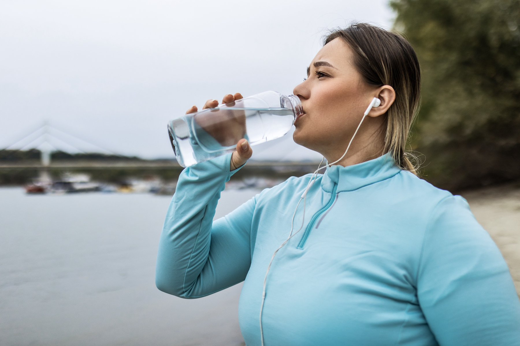 Overweight Woman Finding Serenity in the Pause Hydrating